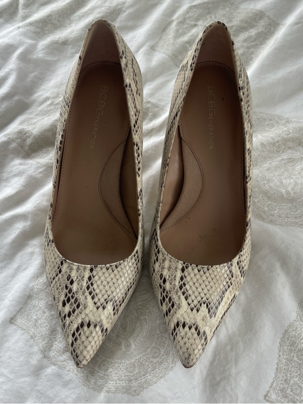 BCBGeneration Snake-Print Pointed Toe Pumps in Cream and Brown